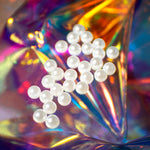Close-up image of the uv pearls in the tiny treasures kit