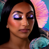 suva beauty's uv festival hydra fx palette with the color "hazy" applied on a model