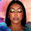 suva beauty's uv festival hydra fx palette with the color "headliner" applied on a model